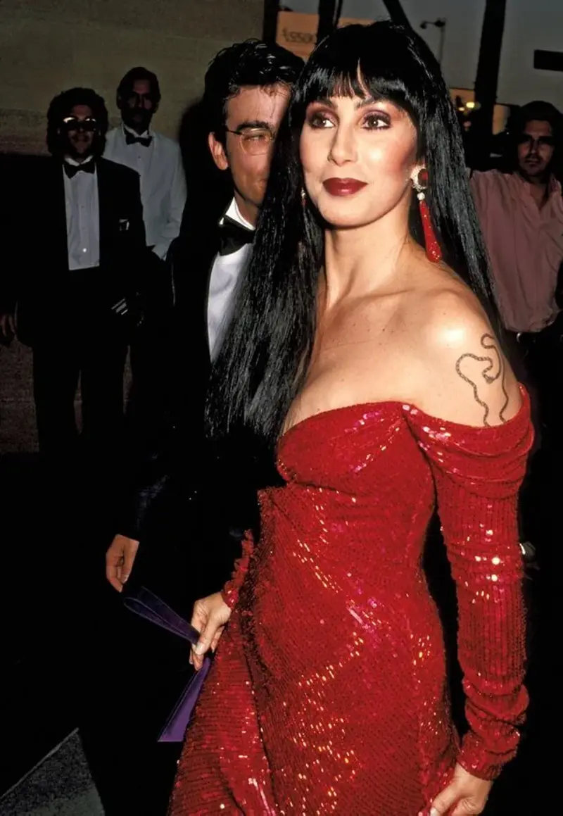 20. Cher Turning Heads in a Red Sequin Gown at an Awards Show 1. First Computer Lesson on an Apple II, 2. An 18-Year-Old Penelope Cruz, 3. Talk About Beach ‘Fit Goals, 4. A Young Marisa Tomei in ‘My Cousin Vinny’, 5. Ronald Reagan Shares a Laugh With Incoming US President Bill Clinton in Washington D.C., 6. A Young Matthew McConaughey on the Set of ‘Dazed and Confused’, 7. ‘My Dad as a High School Student in 1992’, 8. A Young Jack Black Serving Serious Blue Steel, 9. ‘My Dad and Me, Circa 1992’, 10. Tie Dye and Mullets: Just Your Average ’90s Family Portrait, 11. Seattle Rock Band Soundgarden Pictured in California, 12. Behind the Scenes of ‘The Last of the Mohicans’, 13. ’90s House Parties Were Truly Unmatched, 14. A Striking (and Eerie) Self-Portrait at the Foot of the Twin Towers, 15. ‘Skate Crew From High School, 1992’, 16. Iman & David Bowie on Their Wedding Day in Italy, June 6, 1992, 17. People Play Volleyball in Front of a Buddha Statue in Afghanistan, 18. A Young Chris Cornell Performs on Stage in His Signature Plaid, 19. Jodie Foster and Anthony Hopkins Hold Up Their Oscars After Winning Best Actor and Actress for ‘The Silence of the Lambs’, 20. Cher Turning Heads in a Red Sequin Gown at an Awards Show, 21. A Young Winona Ryder During the Filming of ‘Dracula’, 22. The Epic Cast of Saturday Night Live in 1992, 23. ‘The 1992 USA Men’s Olympic Basketball Team, aka the Dream Team’, 24. Kris Kristofferson Comforts Sinéad O’Connor After She Gets Booed on Stage During a Bob Dylan Tribute Concert, 25. Nirvana Pictured in Spain During the Height of the Grunge Era, 26. An Interior Shot of the Mall of America When it First Opened in Bloomington, Minnesota, August 1992, 27. Christian Bale Pictured at His 18th Birthday Party, 28. ‘My Brother Getting Slimed at Universal Studios Florida in 1992’, 29. Alanis Morissette Pictured Doing Shots With Santa, 30. Bruce Campbell Poses With His Many Stunt Doubles on the Set of ‘Army of Darkness’, 31. Michael Jordan Rocks a Matching Set at the ’92 Olympics in Spain
