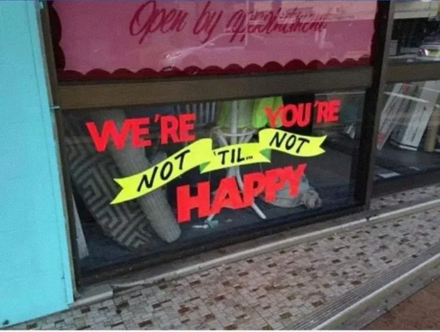 1. We're You're Not 'Til Not Happy?, 2. Warning: reading this sign is the unsafe part, 3. When "plugged-in" becomes the whole design brief, 4. Premium light pole installed, in the middle of the street, 5. How are you supposed to roll those blinds?, 6. "No Everything Im Is Possible": motivation by a word salad, 7. Belle's office chair, now featuring a three-foot neck, 8. You have to put in the work if you really want that pizza, 9. Two security barriers; infinite gaps, 10. Aren't those supposed to go on the inside?, 11. Second-floor door to nowhere; gravity not included, 12. When you order crepes, but end up with something totally different, 13. Punctuation would really help you, Rob, 14. Braille printed on flat paper; "Welcome"... to the problem, 15. Sugar-free oatmeal, with maple and brown sugar, 16. Anti-animal-cruelty hoodie, until the hood drops, 17. White is black, and black is white, 18. The legroom was sold separately, 19. When Nike's Quality Assurance failed us