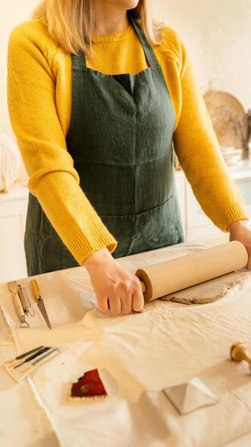 Artisan Linen Apron Marble Rolling Pin With Wooden Cradle, Gold-Plated Salt And Pepper Grinders, Handcrafted Walnut Cutting Board, Crystal Glass Oil And Vinegar Cruet, Copper Hanging Pot Rack, Brass Utensil Holder, Vintage-Inspired Ceramic Butter Dish, Porcelain Mortar And Pestle, Engraved Stainless Steel Measuring Spoons, Artisan Linen Apron, Handmade Rattan Fruit Basket, Etched Glass Canister Set, Polished Stone Cheese Board, Sculptural Wooden Spoon Rest, Elegant Wine Decanter With Stopper