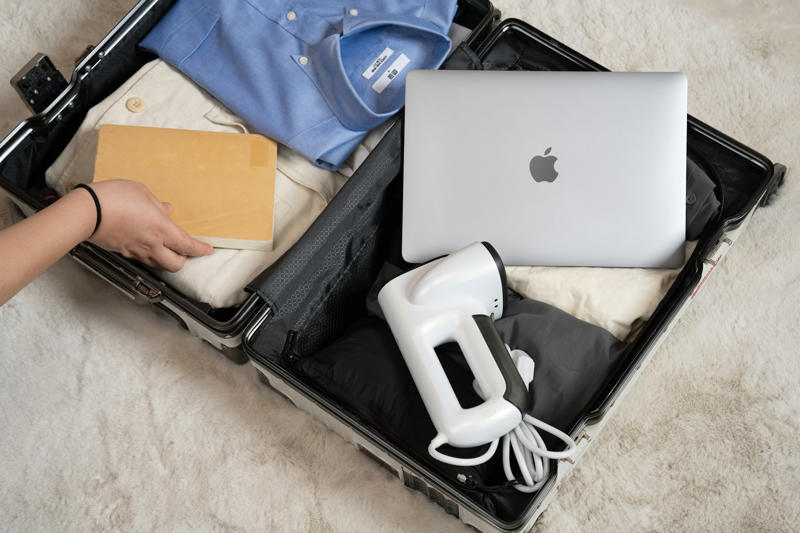 Travel Steamers That Take Up Half Your Bag Neck Pillow That Supports Proper Posture, Noise-Canceling Headphones, Compression Socks For Circulation, Portable Charger With Fast-Charge Capability, Lightweight Travel Blanket, Refillable Water Bottle With Filter, Travel Slippers With Rubber Soles, Travel Steamers That Take Up Half Your Bag, Heavy DSLR Cameras For Casual Trips, Multiple Pairs Of Shoes, Full-Sized Toiletry Kits, Hardcover Books Or Travel Guides, Bulky Travel Neck Fans, Money Belts