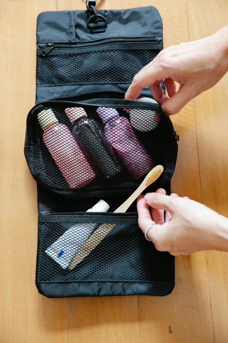 Full-Sized Toiletry Kits Neck Pillow That Supports Proper Posture, Noise-Canceling Headphones, Compression Socks For Circulation, Portable Charger With Fast-Charge Capability, Lightweight Travel Blanket, Refillable Water Bottle With Filter, Travel Slippers With Rubber Soles, Travel Steamers That Take Up Half Your Bag, Heavy DSLR Cameras For Casual Trips, Multiple Pairs Of Shoes, Full-Sized Toiletry Kits, Hardcover Books Or Travel Guides, Bulky Travel Neck Fans, Money Belts