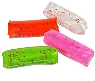 2. Those water-filled squishy tubes that had glitter or plastic animals floating inside them:, 3. This specific medieval castle that you only ever saw at your boy cousin's house:, 4. This Kids Meal Zeus toy that had a glow-in-the-dark lightning bolt:, 5. The Baby All Gone doll that ate these cherries that magically disappeared:, 6. This balancing bird toy that you'd carry around on your finger all day long:, 7. Wooly Willy, which your parents probably gave you to play with during a road trip:, 8. The Creepy Crawlers Workshop, which was SO COOL and the perfect companion to an Easy Bake Oven:, 9. The Barbie "Shop With Me" cash register, because there's nothing kids like to do more than pretend they're working an hourly job:, 10. Silly Putty!!! Specifically, when you would press it against your parents' newspaper and copy the ink onto the putty:, 11. Those robot dogs you begged your parents for because they never let you get a Furby:, 12. Polly Pockets, which were so tiny and cute, and at the same time, the most painful experience in the world if you ever stepped on one:, 13. Doodle Bears, which were perfect for all the kids who absolutely loved giving their dolls makeovers:, 14. Supersoakers!!! There were so many to choose from, but they all elicited the same amount of fun:, 15. The Laser Challenge game set that you could wear around your house and play with...until your parents made you put it away:, 16. Nickelodeon's Floam, because in the '90s, all forms of slime were king:, 17. The OG version of Pretty Pretty Princess, which was an absurd amount of fun for a game that had almost zero rules:, 18. Sky Dancers, which were so fun to make fly, but hurt so bad if they landed on your head:, 19. A Talkboy or Talkgirl, because there's nothing more '90s kids loved more than pretending they were spies: