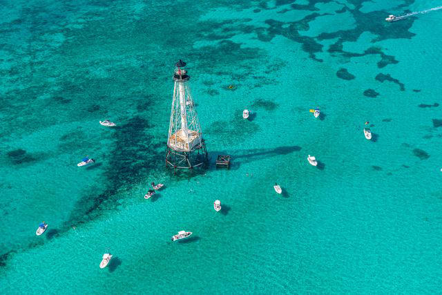 The Seas Around Islamorada, Christ of the Abyss at John Pennekamp Coral Reef State Park, Bahia Honda State Park, The Caribbean Club, Robbie's, Key Largo Fisheries, Pierre’s Restaurant, Dry Tortugas National Park, Alligator Reef Sanctuary Preservation Area, Founders Park
