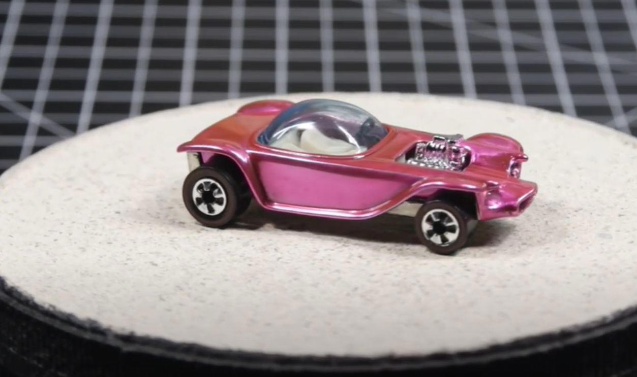 Money On Tiny Wheels, 1968 Brown Custom Camaro, 1968 White Custom Camaro, 1968 Pink Beatnik Bandit, 1969 Red Baron With White Interior, 1971 Red Olds 442 With Black Interior, 1972 Green Open Fire, 1972 Pink Superfine Turbine, 1974 Blue Rodger Dodger, 1974 Magenta Rodger Dodger With White Interior, 1977 White Z-Whiz, 1968 Python With “Cheetah” Base, 1968 Custom Volkswagen Without Sunroof, 1968 Rear-Loading Volkswagen Beach Bomb, 1970 Ed Shaver Custom AMX, 1969 Purple Olds 442, 1971 Purple Olds 442, 1970 Mad Maverick With “Mad” Base, 1971 Snake And Mongoose Dragsters, 1969 Purple Bye Focal, 1970 Purple Olds 442 With White Interior, 1968 Custom Barracuda In Apple Green