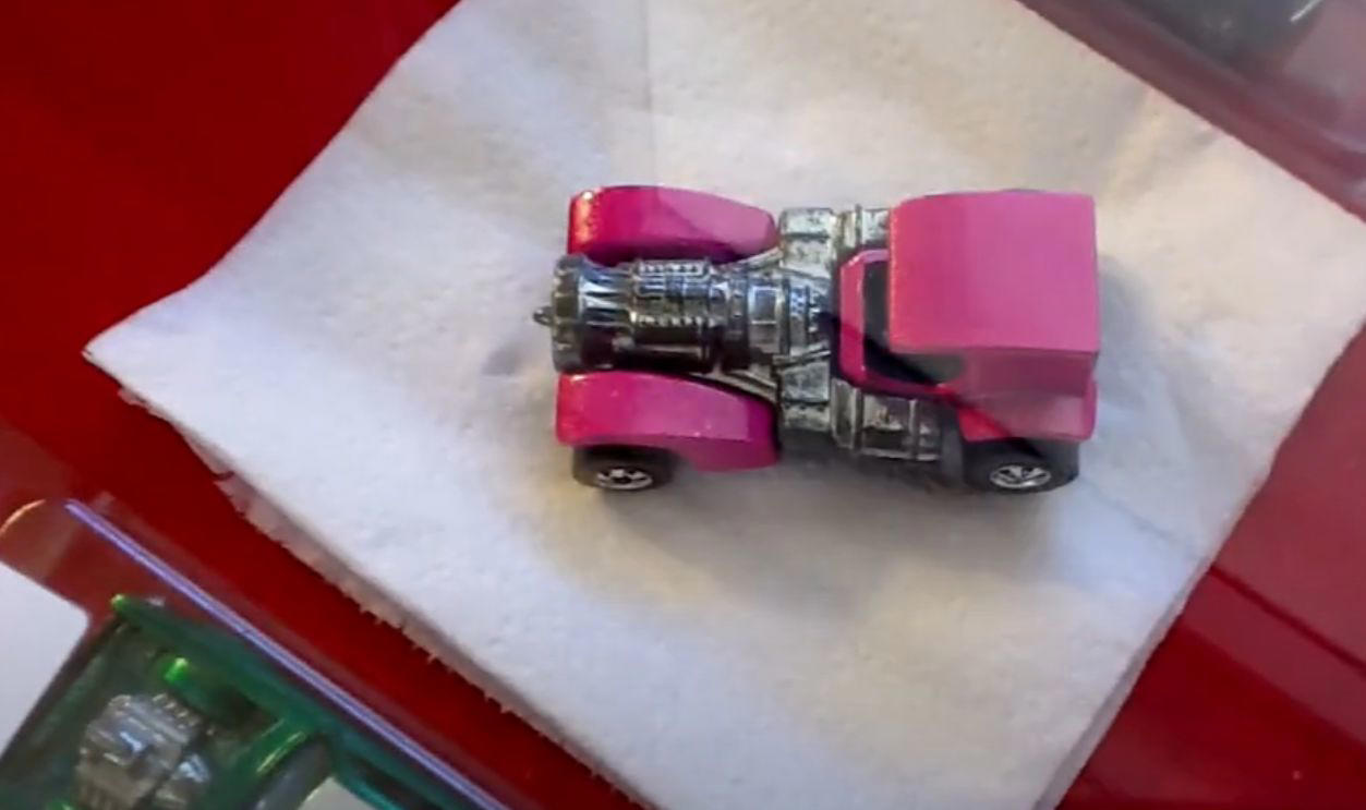 Money On Tiny Wheels, 1968 Brown Custom Camaro, 1968 White Custom Camaro, 1968 Pink Beatnik Bandit, 1969 Red Baron With White Interior, 1971 Red Olds 442 With Black Interior, 1972 Green Open Fire, 1972 Pink Superfine Turbine, 1974 Blue Rodger Dodger, 1974 Magenta Rodger Dodger With White Interior, 1977 White Z-Whiz, 1968 Python With “Cheetah” Base, 1968 Custom Volkswagen Without Sunroof, 1968 Rear-Loading Volkswagen Beach Bomb, 1970 Ed Shaver Custom AMX, 1969 Purple Olds 442, 1971 Purple Olds 442, 1970 Mad Maverick With “Mad” Base, 1971 Snake And Mongoose Dragsters, 1969 Purple Bye Focal, 1970 Purple Olds 442 With White Interior, 1968 Custom Barracuda In Apple Green