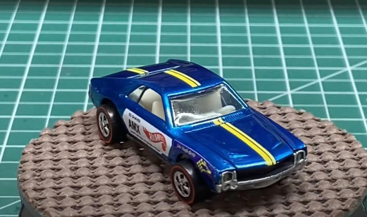 Money On Tiny Wheels, 1968 Brown Custom Camaro, 1968 White Custom Camaro, 1968 Pink Beatnik Bandit, 1969 Red Baron With White Interior, 1971 Red Olds 442 With Black Interior, 1972 Green Open Fire, 1972 Pink Superfine Turbine, 1974 Blue Rodger Dodger, 1974 Magenta Rodger Dodger With White Interior, 1977 White Z-Whiz, 1968 Python With “Cheetah” Base, 1968 Custom Volkswagen Without Sunroof, 1968 Rear-Loading Volkswagen Beach Bomb, 1970 Ed Shaver Custom AMX, 1969 Purple Olds 442, 1971 Purple Olds 442, 1970 Mad Maverick With “Mad” Base, 1971 Snake And Mongoose Dragsters, 1969 Purple Bye Focal, 1970 Purple Olds 442 With White Interior, 1968 Custom Barracuda In Apple Green