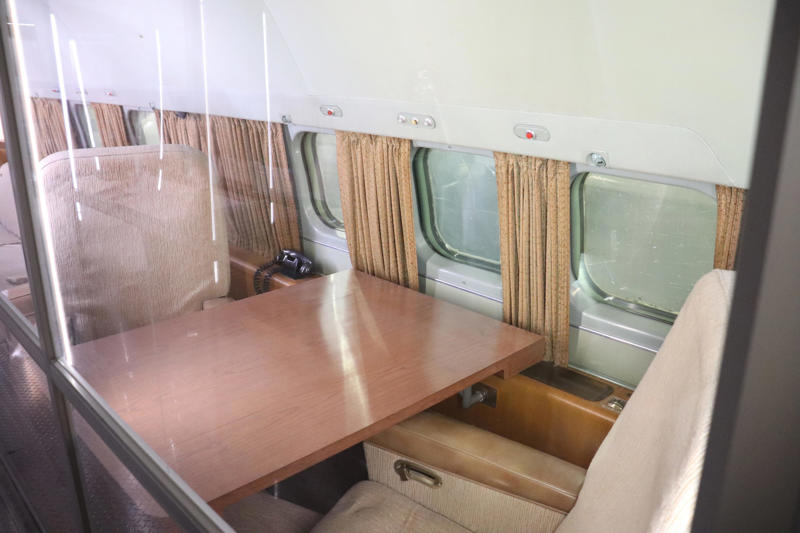 Eisenhower's presidential stateroom was located toward the back of the plane. The cockpit featured seats for the pilot, copilot, and flight engineer., The radio operator worked out of this room behind the cockpit., Storage areas separated the crew from Eisenhower's presidential workspace., This seating area was used by members of Eisenhower's staff., Eisenhower's presidential stateroom was located toward the back of the plane., The stateroom also featured two couches that could fold down into beds., The most luxurious part of the plane was the president's spacious lavatory.