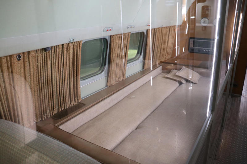 The stateroom also featured two couches that could fold down into beds. The cockpit featured seats for the pilot, copilot, and flight engineer., The radio operator worked out of this room behind the cockpit., Storage areas separated the crew from Eisenhower's presidential workspace., This seating area was used by members of Eisenhower's staff., Eisenhower's presidential stateroom was located toward the back of the plane., The stateroom also featured two couches that could fold down into beds., The most luxurious part of the plane was the president's spacious lavatory.