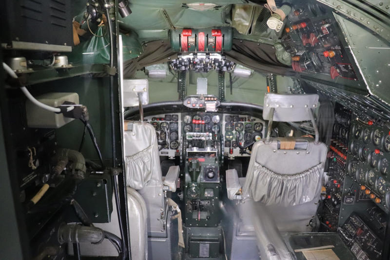 The cockpit featured seats for the pilot, copilot, and flight engineer. The cockpit featured seats for the pilot, copilot, and flight engineer., The radio operator worked out of this room behind the cockpit., Storage areas separated the crew from Eisenhower's presidential workspace., This seating area was used by members of Eisenhower's staff., Eisenhower's presidential stateroom was located toward the back of the plane., The stateroom also featured two couches that could fold down into beds., The most luxurious part of the plane was the president's spacious lavatory.