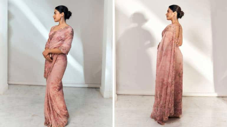 Softness in bloom If bright hues are not your vibe, go for a nature-inspired floral saree in pastel. The one Rashmika sports offers just the right inspiration. Beautified with embroidered motifs, it gives off a soft, charming vibe that’s hard to miss.