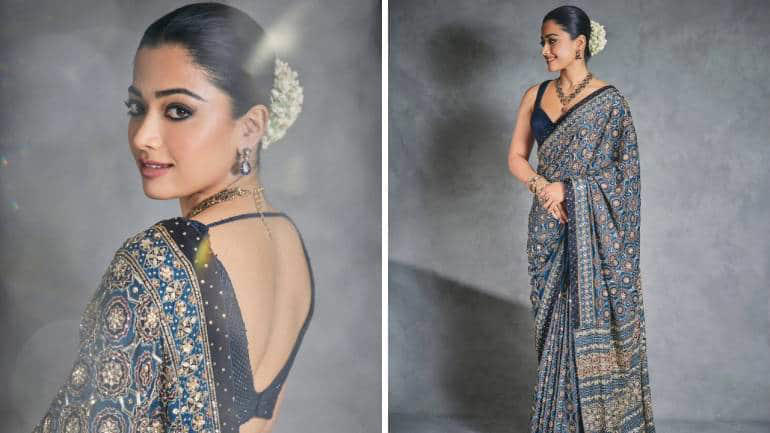 Magical in midnight blue Rashmika’s Ajrakh handcrafted saree is adorned with zardozi and sari embroidery. It drapes beautifully and is styled with matching jewellery and gajra for desi effect. For those who prefer understated glamour, this one’s a perfect pick.
