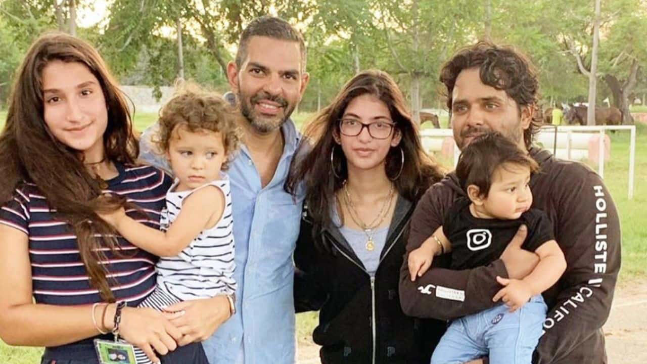 Captured in this candid frame, Sunjay Kapur stands alongside his family, surrounded by affection and togetherness. It reflects not just a gathering, but a memory of love that endures.