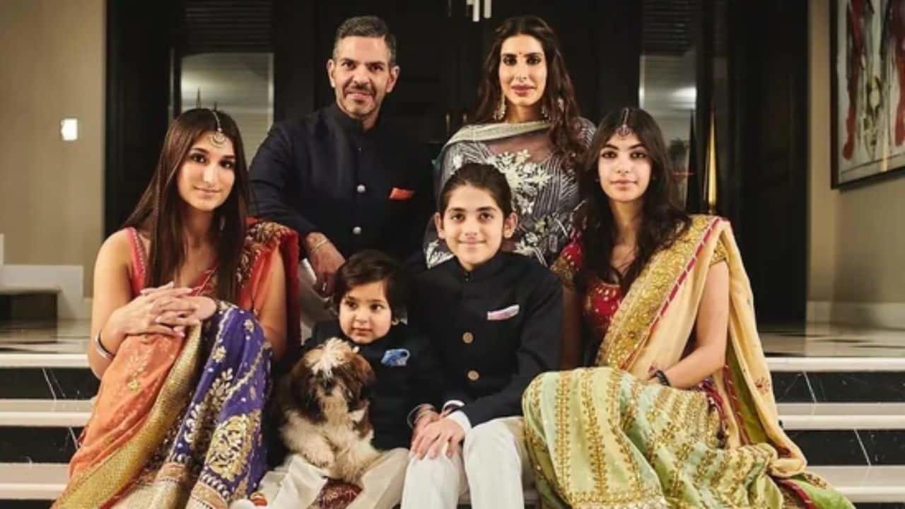 Sunjay Kapoor is pictured here with wife Priya Sachdev and their children, all dressed in elegant traditional outfits. The family portrait, warm and regal, reflects both love and cultural pride.