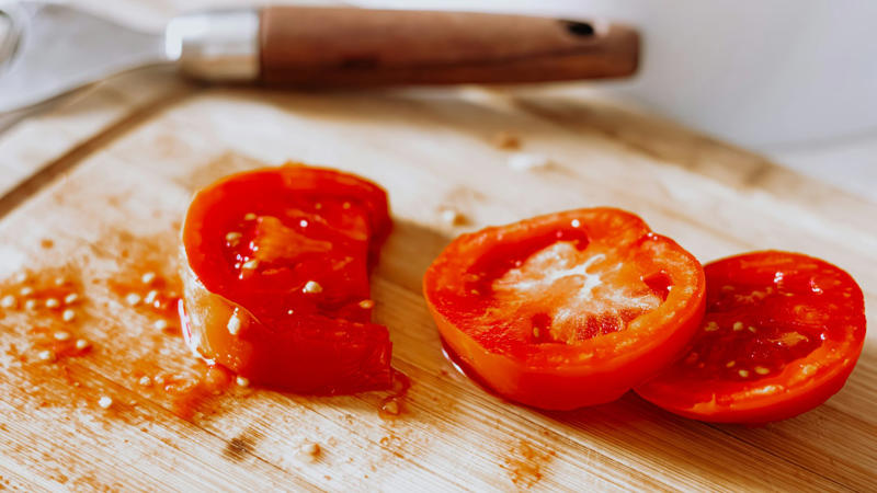 1. Keep Herbs Fresh Longer, 2. Freeze Leftover Wine, 3. Use a Spoon to Peel Ginger, 4. Stop Boiling Over, 5. Make Your Garlic Last, 6. Microwave Lemons to Juice, 7. Stop Oil from Splattering, 8. Reheat Pizza Like a Pro, 9. Peel Tomatoes Easily, 10. Keep Brown Sugar Soft, 11. Freeze Cheese for Grating, 12. The Ice Cube Trick for Soups, 13. Stop Pasta from Sticking, 14. Make Buttermilk Fast, 15. Keep Avocados from Browning, 16. Shake Marinades Instead of Stirring, 17. Make Onion Tears Optional, 18. Pop Corn in a Paper Bag, 19. Egg Peeling Hack, 20. Reuse Herb Stems