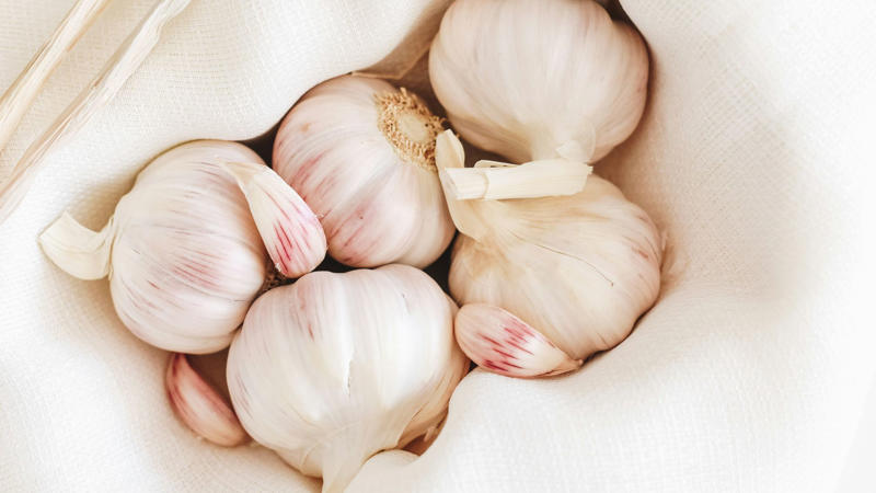 1. Keep Herbs Fresh Longer, 2. Freeze Leftover Wine, 3. Use a Spoon to Peel Ginger, 4. Stop Boiling Over, 5. Make Your Garlic Last, 6. Microwave Lemons to Juice, 7. Stop Oil from Splattering, 8. Reheat Pizza Like a Pro, 9. Peel Tomatoes Easily, 10. Keep Brown Sugar Soft, 11. Freeze Cheese for Grating, 12. The Ice Cube Trick for Soups, 13. Stop Pasta from Sticking, 14. Make Buttermilk Fast, 15. Keep Avocados from Browning, 16. Shake Marinades Instead of Stirring, 17. Make Onion Tears Optional, 18. Pop Corn in a Paper Bag, 19. Egg Peeling Hack, 20. Reuse Herb Stems