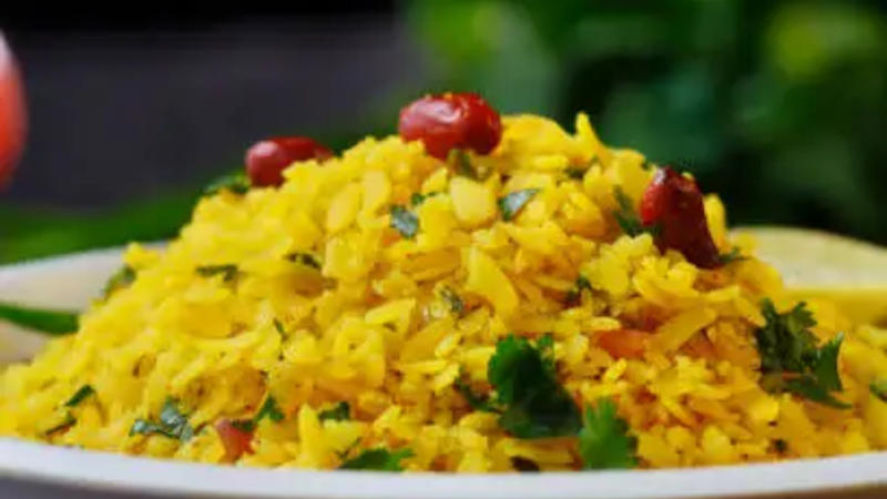 Poha: A light, iron rich dish often made with vegetables and peanuts, perfect for a wholesome breakfast or snack.