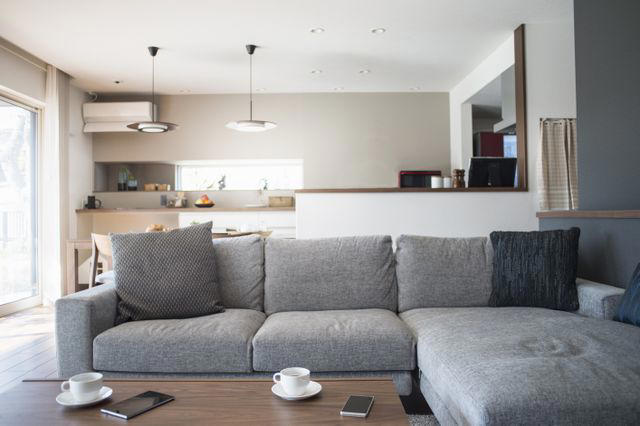 An Oversized Sofa in the Middle, Too Many Chairs, A Rug That's Too Small, Low and Flat Seating, Furniture Against the Walls, Poorly-Fitting Drapes