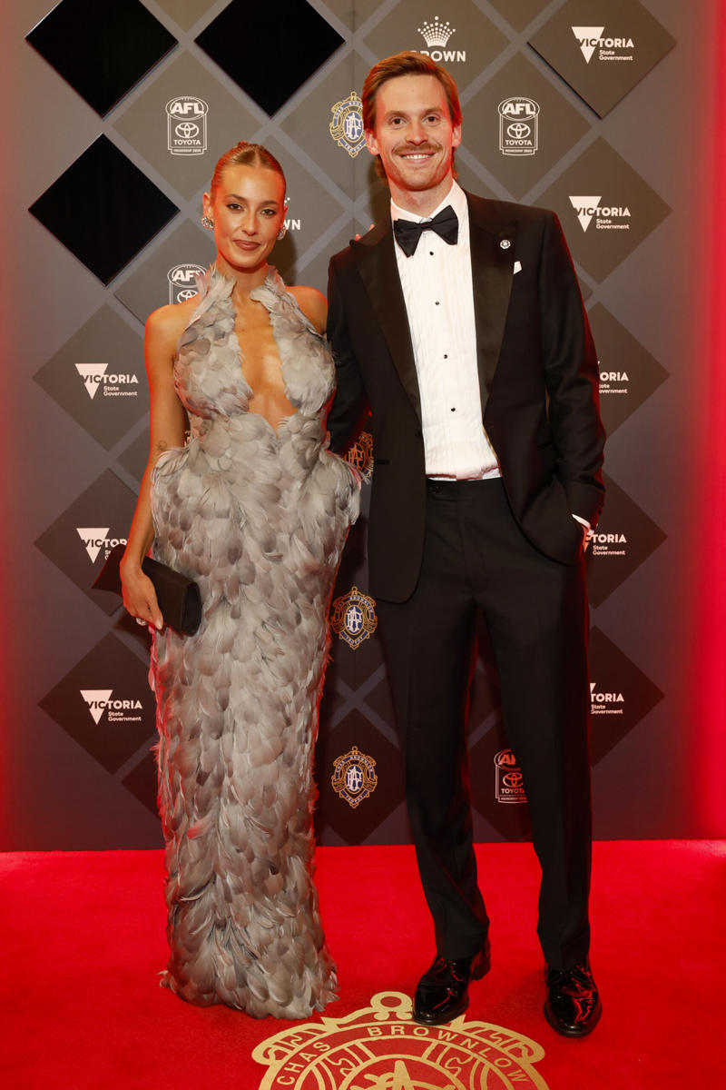 See All The Red Carpet Looks From The 2025 Brownlow Medal,      Lexi Mary   ,      Elle Ray   ,      Abbey Holmes   ,      Connor O’Sullican and Libby Cliffford   ,      Max Holmes and Jess Butler    ,      Charli Wheeler and Noah Anderson   ,      Ben Keays and Rosie Konstantinou   ,      Paige Bramley and Josh Worrell    ,      Sam Flanders Ellie Dickinson   ,      Charlie Curnow fiancée Tiana Simic   ,      Isaac Heeney and Steffanie Waters    ,      Jordan Dawson and Milly Dawson   ,      Zach Merrett and Alexandra Merrett   ,      Riley Thilthorpe and partner Nikita Iskra    ,      Callum Mills and Tiffany Mills    ,      Levi Ashcroft and Meka Norton-Smith    ,      Nick Daicos and Arlette Amor    ,      Brodie Grundy and Rachel Wertheim   ,      See Salmin   ,      Patrick Cripps and Monique Cripp   ,      Andrew McGrath and Emma Laughlin   ,      Josh Daicos and Annalise Dalins   ,      Luke Davies-Uniacke and Timnah Poratt    