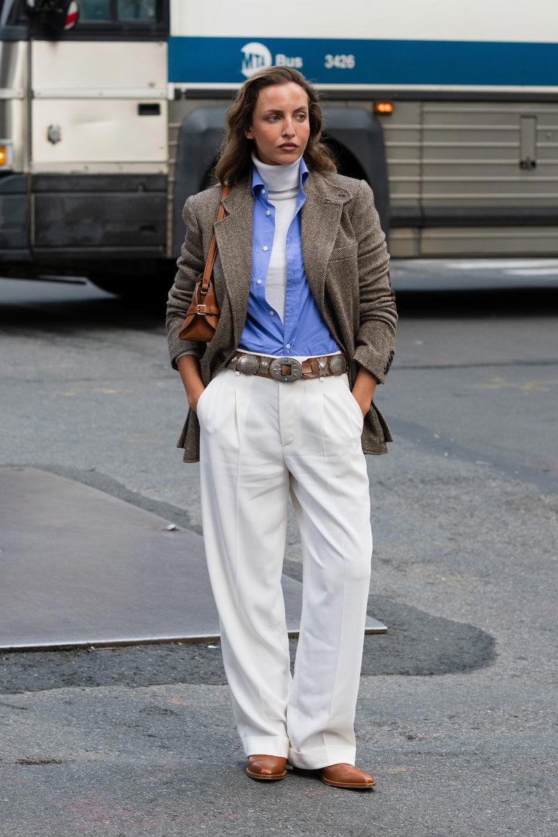 1. Wear a Slip Dress Over Satin Pants, 2. Mix Cotton Classics with Expert Tailoring, 3. Slip a Trench Coat Over a Blazer, 4. Layer Up on Knitwear Instead of a Scarf, 5. Style a Button-Up Under a Cape Jacket, 6. Add a Pop of Color With a Mock-Neck Top, 7. Use a Ribbed Turtleneck Under a Button-Down and Blazer, 8. Mix Necklines with a Sporty Finishing Touch