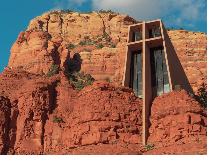 ARIZONA: Chapel of the Holy Cross ALABAMA: Gulf, Mobile, and Ohio Passenger Terminal, ALASKA: The University of Alaska's Museum of the North, ARIZONA: Chapel of the Holy Cross, ARKANSAS: Thorncrown Chapel, CALIFORNIA: The Chemosphere, CONNECTICUT: Grace Farms, DELAWARE: Wilmington's Grand Opera House, FLORIDA: The Salvador Dalí Museum, HAWAII: ʻIolani Palace, IDAHO: The Dog Bark Park Inn, ILLINOIS: Bahá'í House of Worship, INDIANA: West Baden Springs Hotel, IOWA: Grotto of the Redemption, KANSAS: Big Well in Greensburg, KENTUCKY: Churchill Downs, LOUISIANA: The Pontalba Buildings, MAINE: The Portland Head Light, MARYLAND: The American Visionary Art Museum, MASSACHUSETTS: Simmons Hall at MIT, MICHIGAN: Charles H. Wright Museum of African American History, MINNESOTA: The Marjorie McNeely Conservatory, MISSOURI: The Community Bookshelf, MONTANA: Montana State Capitol building, NEVADA: Ward Charcoal Ovens, NEW HAMPSHIRE: Mount Washington Hotel, NEW JERSEY: Nassau Hall at Princeton University, NEW YORK: The Chrysler Building, NORTH DAKOTA: The North Dakota Heritage Center, OHIO: The Longaberger Company building, SOUTH DAKOTA: The Corn Palace, TENNESSEE: Parthenon in Centennial Park, TEXAS: James Turrell's Twilight Epiphany skyspace, UTAH: Natural History Museum of Utah, VERMONT: The Old Round Church, VIRGINIA: Dulles International Airport, WASHINGTON: Seattle Central Library, WEST VIRGINIA: The Palace of Gold, WISCONSIN: The Burke Brise Soleil, WYOMING: Smith Mansion