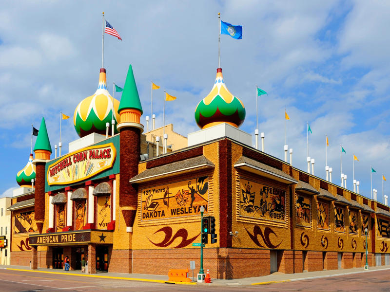 SOUTH DAKOTA: The Corn Palace ALABAMA: Gulf, Mobile, and Ohio Passenger Terminal, ALASKA: The University of Alaska's Museum of the North, ARIZONA: Chapel of the Holy Cross, ARKANSAS: Thorncrown Chapel, CALIFORNIA: The Chemosphere, CONNECTICUT: Grace Farms, DELAWARE: Wilmington's Grand Opera House, FLORIDA: The Salvador Dalí Museum, HAWAII: ʻIolani Palace, IDAHO: The Dog Bark Park Inn, ILLINOIS: Bahá'í House of Worship, INDIANA: West Baden Springs Hotel, IOWA: Grotto of the Redemption, KANSAS: Big Well in Greensburg, KENTUCKY: Churchill Downs, LOUISIANA: The Pontalba Buildings, MAINE: The Portland Head Light, MARYLAND: The American Visionary Art Museum, MASSACHUSETTS: Simmons Hall at MIT, MICHIGAN: Charles H. Wright Museum of African American History, MINNESOTA: The Marjorie McNeely Conservatory, MISSOURI: The Community Bookshelf, MONTANA: Montana State Capitol building, NEVADA: Ward Charcoal Ovens, NEW HAMPSHIRE: Mount Washington Hotel, NEW JERSEY: Nassau Hall at Princeton University, NEW YORK: The Chrysler Building, NORTH DAKOTA: The North Dakota Heritage Center, OHIO: The Longaberger Company building, SOUTH DAKOTA: The Corn Palace, TENNESSEE: Parthenon in Centennial Park, TEXAS: James Turrell's Twilight Epiphany skyspace, UTAH: Natural History Museum of Utah, VERMONT: The Old Round Church, VIRGINIA: Dulles International Airport, WASHINGTON: Seattle Central Library, WEST VIRGINIA: The Palace of Gold, WISCONSIN: The Burke Brise Soleil, WYOMING: Smith Mansion
