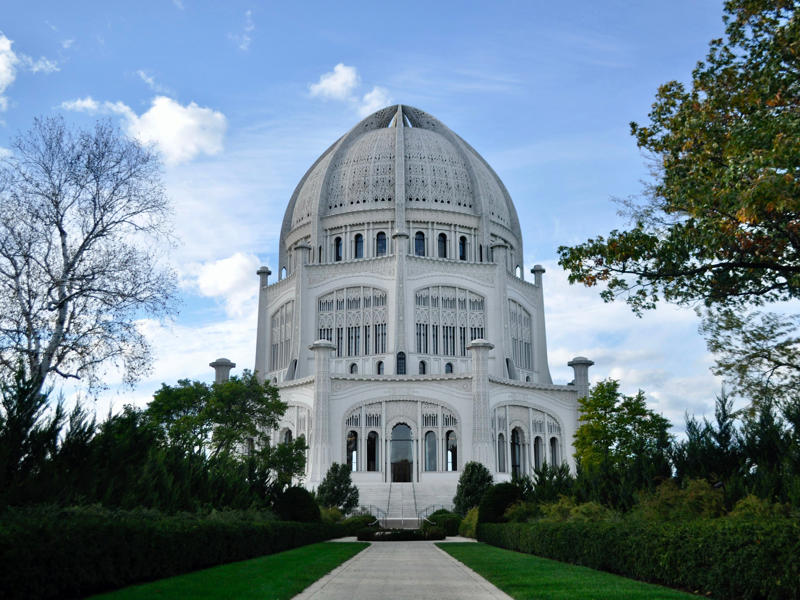 ILLINOIS: Bahá'í House of Worship ALABAMA: Gulf, Mobile, and Ohio Passenger Terminal, ALASKA: The University of Alaska's Museum of the North, ARIZONA: Chapel of the Holy Cross, ARKANSAS: Thorncrown Chapel, CALIFORNIA: The Chemosphere, CONNECTICUT: Grace Farms, DELAWARE: Wilmington's Grand Opera House, FLORIDA: The Salvador Dalí Museum, HAWAII: ʻIolani Palace, IDAHO: The Dog Bark Park Inn, ILLINOIS: Bahá'í House of Worship, INDIANA: West Baden Springs Hotel, IOWA: Grotto of the Redemption, KANSAS: Big Well in Greensburg, KENTUCKY: Churchill Downs, LOUISIANA: The Pontalba Buildings, MAINE: The Portland Head Light, MARYLAND: The American Visionary Art Museum, MASSACHUSETTS: Simmons Hall at MIT, MICHIGAN: Charles H. Wright Museum of African American History, MINNESOTA: The Marjorie McNeely Conservatory, MISSOURI: The Community Bookshelf, MONTANA: Montana State Capitol building, NEVADA: Ward Charcoal Ovens, NEW HAMPSHIRE: Mount Washington Hotel, NEW JERSEY: Nassau Hall at Princeton University, NEW YORK: The Chrysler Building, NORTH DAKOTA: The North Dakota Heritage Center, OHIO: The Longaberger Company building, SOUTH DAKOTA: The Corn Palace, TENNESSEE: Parthenon in Centennial Park, TEXAS: James Turrell's Twilight Epiphany skyspace, UTAH: Natural History Museum of Utah, VERMONT: The Old Round Church, VIRGINIA: Dulles International Airport, WASHINGTON: Seattle Central Library, WEST VIRGINIA: The Palace of Gold, WISCONSIN: The Burke Brise Soleil, WYOMING: Smith Mansion