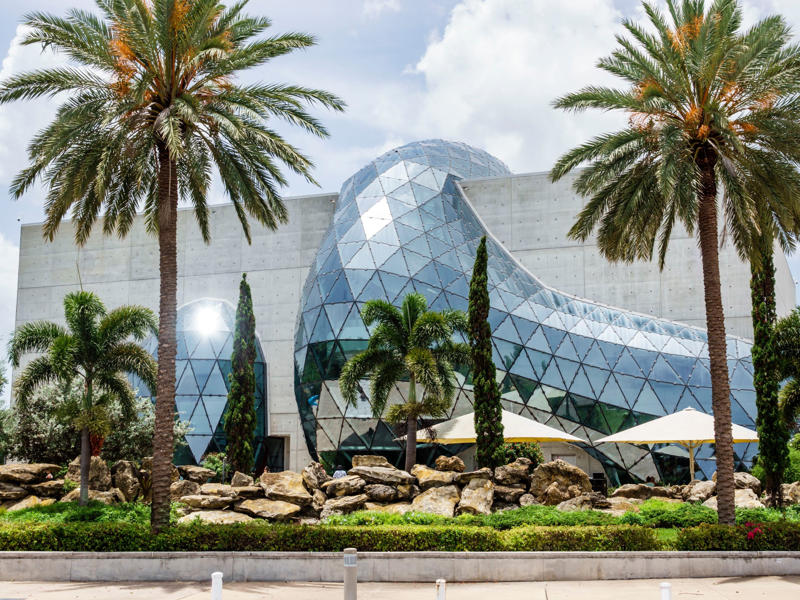 FLORIDA: The Salvador Dalí Museum ALABAMA: Gulf, Mobile, and Ohio Passenger Terminal, ALASKA: The University of Alaska's Museum of the North, ARIZONA: Chapel of the Holy Cross, ARKANSAS: Thorncrown Chapel, CALIFORNIA: The Chemosphere, CONNECTICUT: Grace Farms, DELAWARE: Wilmington's Grand Opera House, FLORIDA: The Salvador Dalí Museum, HAWAII: ʻIolani Palace, IDAHO: The Dog Bark Park Inn, ILLINOIS: Bahá'í House of Worship, INDIANA: West Baden Springs Hotel, IOWA: Grotto of the Redemption, KANSAS: Big Well in Greensburg, KENTUCKY: Churchill Downs, LOUISIANA: The Pontalba Buildings, MAINE: The Portland Head Light, MARYLAND: The American Visionary Art Museum, MASSACHUSETTS: Simmons Hall at MIT, MICHIGAN: Charles H. Wright Museum of African American History, MINNESOTA: The Marjorie McNeely Conservatory, MISSOURI: The Community Bookshelf, MONTANA: Montana State Capitol building, NEVADA: Ward Charcoal Ovens, NEW HAMPSHIRE: Mount Washington Hotel, NEW JERSEY: Nassau Hall at Princeton University, NEW YORK: The Chrysler Building, NORTH DAKOTA: The North Dakota Heritage Center, OHIO: The Longaberger Company building, SOUTH DAKOTA: The Corn Palace, TENNESSEE: Parthenon in Centennial Park, TEXAS: James Turrell's Twilight Epiphany skyspace, UTAH: Natural History Museum of Utah, VERMONT: The Old Round Church, VIRGINIA: Dulles International Airport, WASHINGTON: Seattle Central Library, WEST VIRGINIA: The Palace of Gold, WISCONSIN: The Burke Brise Soleil, WYOMING: Smith Mansion