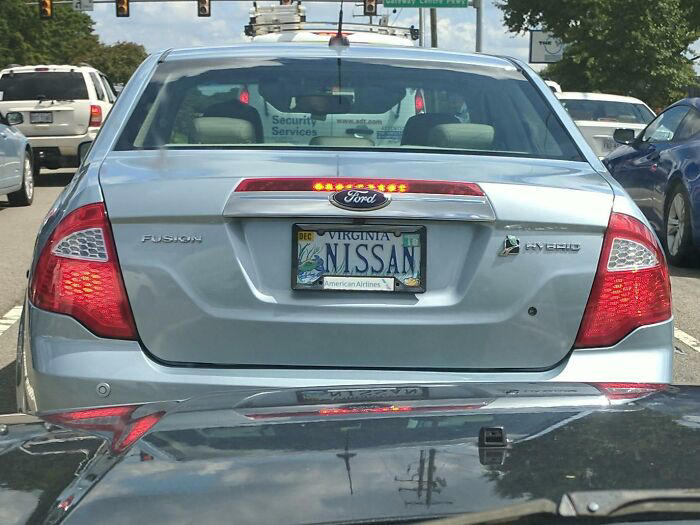 1. Whasaab, 2. Brand confusion, 3. Subauwu, 4. Get a load of this guy, 6. The impala, 7. An awh-sum car, 8. Ur obese, 9. Why be normal, 10. A very Canadian plate, 11. Comedy in one word, 12. Cheeto Jeep, 13. Luxury with a side of humility, 14. Midlife dream or crisis, 15. No problem parking, 16. Meta, 17. Sassy exit, 18. It’s a vibe, 19. License plate therapy session, 20. Purrsonality on wheels, 21. Owning it, 22. Keeping it literal, 23. Priorities on display, 24. Serving royal energy, 25. Weewoo on wheels, 26. Corvette over retirement, 27. Minivan mythology, 28. Big wheels, green dreams, 29. Owning the slow lane, 30. Queen of the mud pits