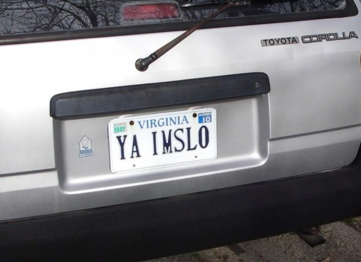 1. Whasaab, 2. Brand confusion, 3. Subauwu, 4. Get a load of this guy, 6. The impala, 7. An awh-sum car, 8. Ur obese, 9. Why be normal, 10. A very Canadian plate, 11. Comedy in one word, 12. Cheeto Jeep, 13. Luxury with a side of humility, 14. Midlife dream or crisis, 15. No problem parking, 16. Meta, 17. Sassy exit, 18. It’s a vibe, 19. License plate therapy session, 20. Purrsonality on wheels, 21. Owning it, 22. Keeping it literal, 23. Priorities on display, 24. Serving royal energy, 25. Weewoo on wheels, 26. Corvette over retirement, 27. Minivan mythology, 28. Big wheels, green dreams, 29. Owning the slow lane, 30. Queen of the mud pits