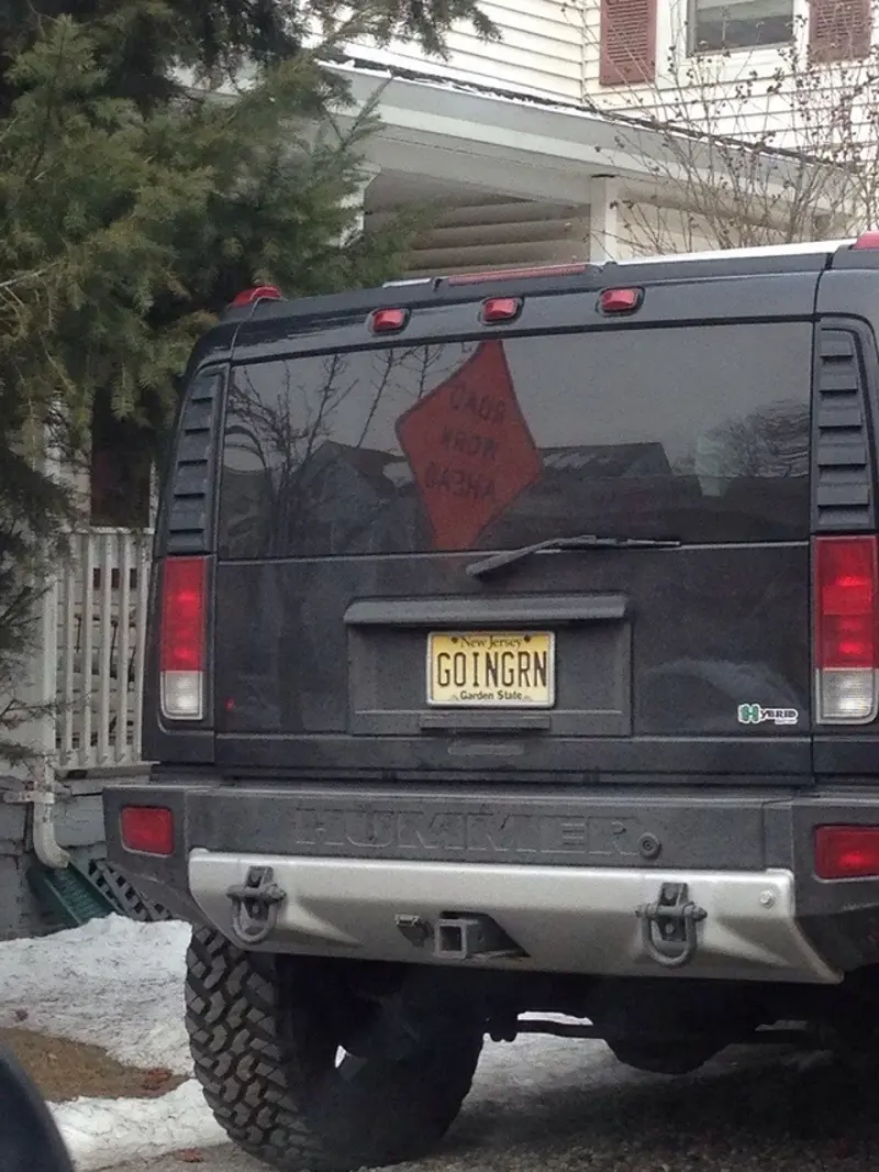 1. Whasaab, 2. Brand confusion, 3. Subauwu, 4. Get a load of this guy, 6. The impala, 7. An awh-sum car, 8. Ur obese, 9. Why be normal, 10. A very Canadian plate, 11. Comedy in one word, 12. Cheeto Jeep, 13. Luxury with a side of humility, 14. Midlife dream or crisis, 15. No problem parking, 16. Meta, 17. Sassy exit, 18. It’s a vibe, 19. License plate therapy session, 20. Purrsonality on wheels, 21. Owning it, 22. Keeping it literal, 23. Priorities on display, 24. Serving royal energy, 25. Weewoo on wheels, 26. Corvette over retirement, 27. Minivan mythology, 28. Big wheels, green dreams, 29. Owning the slow lane, 30. Queen of the mud pits