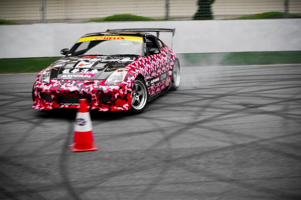 Beyond Limits: The Human Art of Drifting and the Autonomous Tech Redefining Sideways Driving Debunking Myths About Used Cars, File:Polizia car drifting at Hollywood Stunt Driver.jpg, Elegant BMW car interior showcasing navigation screen, speedometer, and steering wheel., Rallye car drifting, The Autonomous Leap: Toyota and Stanford's Sideways Innovation