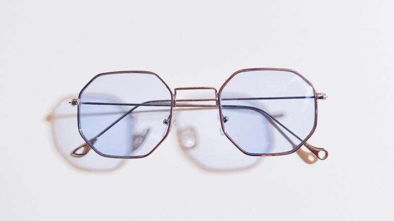 1. Classic Round Frames, 2. Bold Wayfarer Frames, 3. Transparent Frames, 4. Cat-Eye Glasses, 5. Oversized Frames, 6. Aviator Glasses, 7. Geometric Frames, 8. Wooden Frames, 9. Metal Rimless Glasses, 10. Double Bridge Frames, 11. Thick Black Frames, 12. Tortoiseshell Patterns, 13. Sporty Wrap-Around Frames, 14. Semi-Rimless Frames, 15. Gradient Color Frames, 16. Vintage Wire Frames, 17. Asymmetrical Frames, 18. Glow-In-The-Dark Frames, 19. Custom Painted Hand-Decorated Frames, 20. Eco-Friendly Recycled Material Frames