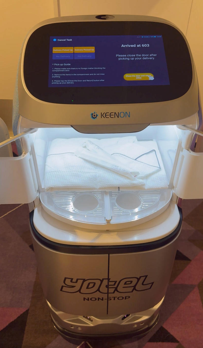 Once the robot room service arrived, I received an automated call on my in-room phone alerting me to open the door.