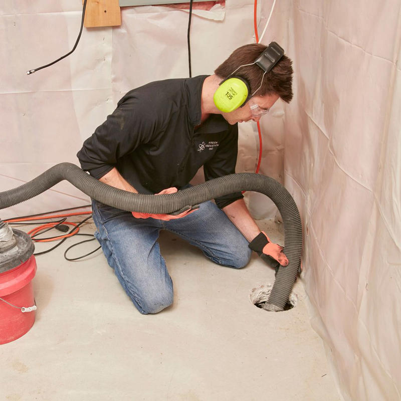 DIY Radon Reduction, What is Radon?, Seal holes and cracks first, Find the footing, Make a big hole with several small ones, Make a suction pit, Dry-fit all the piping, Install fire-stop collars in garages, Exit through the rim joist, Install a manometer, Do another radon test, About the Expert