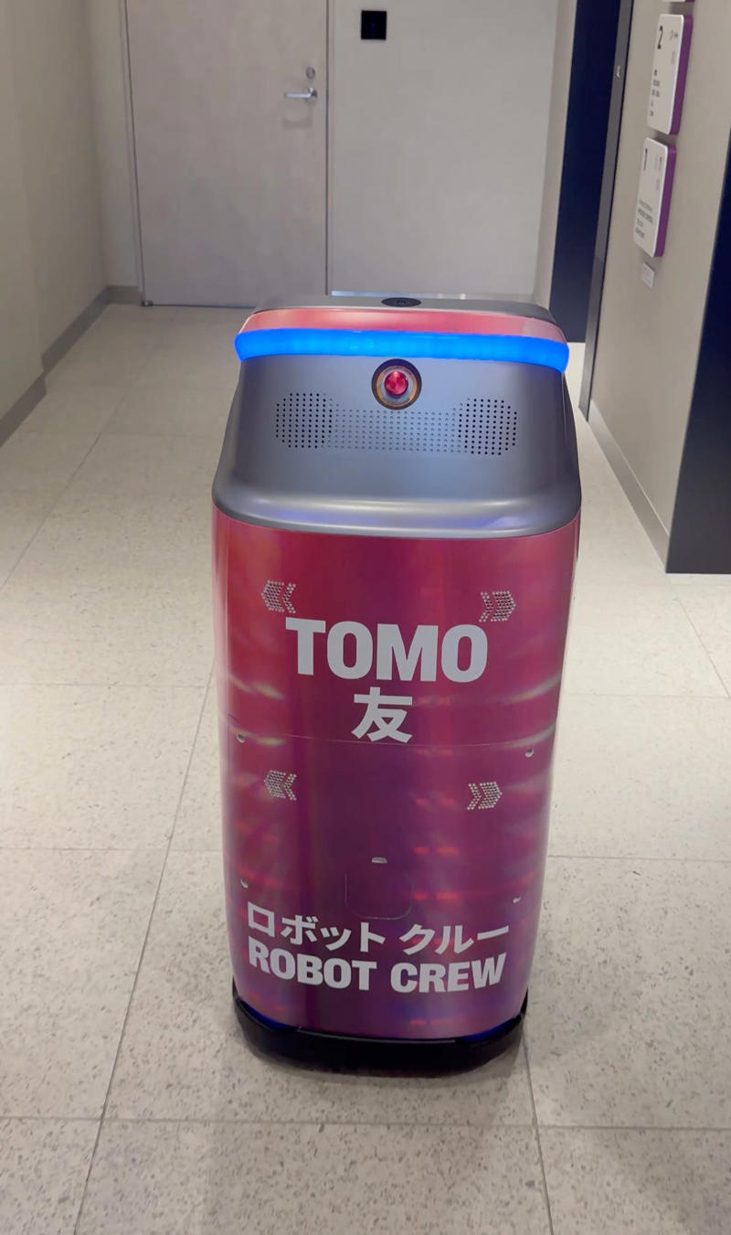 Once I received my room key, I scanned it with Tomo, who promptly escorted me up to my room.