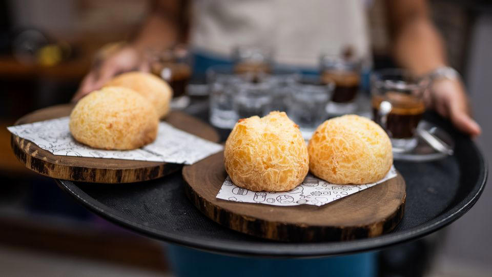 Bolani, Afghanistan, Lavash, Armenia, Damper bread, Australia, Luchi, Bangladesh, Pão de queijo, Brazil, Montreal bagels, Canada, Marraqueta, Chile, Shaobing, China, Pan Cubano, Cuba, Libba, Egypt, Pupusas, El Salvador, Injera, Ethiopia, Baguette, France, Khachapuri, Georgia, Pumpernickel, Germany, Pai bao, Hong Kong, Dökkt rúgbrauð, Iceland, Paratha, India, Roti gambang, Indonesia, Sangak, Iran, Soda bread, Ireland, Challah, Israel, Ciabatta, Italy, Bammy bread, Jamaica, Kare pan, Japan, Taboon bread, Jordan, Roti canai, Malaysia, Ħobż tal-Malti, Malta, Tortillas, Mexico, Khobz kesra, Morocco, Fry bread, Navajo Nation, Tijgerbrood, Netherlands, Rēwena parāoa, New Zealand, Lefse, Norway, Podplomyk, Poland, Broa de milho, Portugal, Karavai, Russia, Pane carasau, Sardinia, Proja, Serbia, Gyeran-ppang, South Korea, Appam, Sri Lanka, Kisra, Sudan and South Sudan, Limpa bread, Sweden, Balep korkun, Tibet, Simit, Turkey, Crumpets, United Kingdom, Biscuits, United States, Non, Uzbekistan, Arepa, Venezuela, Malawach, Yemen