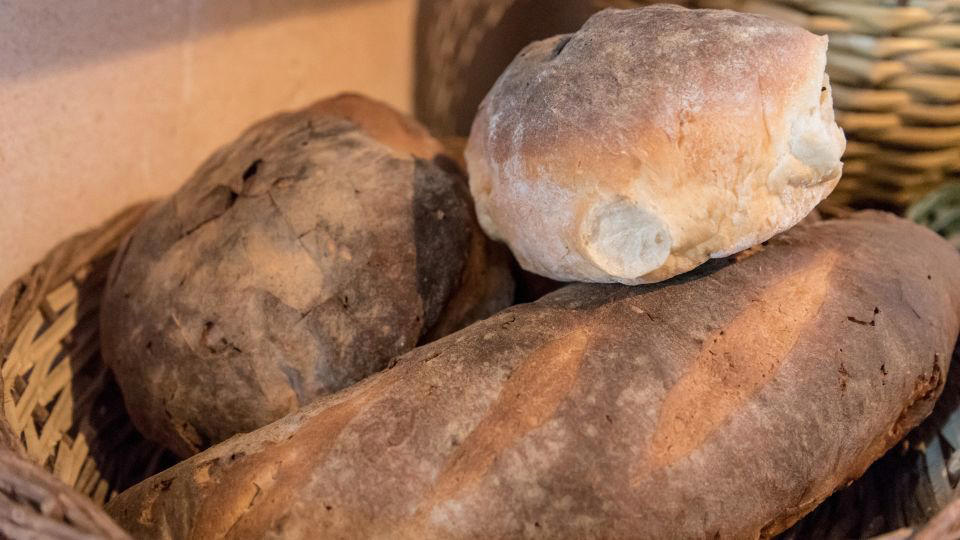 Bolani, Afghanistan, Lavash, Armenia, Damper bread, Australia, Luchi, Bangladesh, Pão de queijo, Brazil, Montreal bagels, Canada, Marraqueta, Chile, Shaobing, China, Pan Cubano, Cuba, Libba, Egypt, Pupusas, El Salvador, Injera, Ethiopia, Baguette, France, Khachapuri, Georgia, Pumpernickel, Germany, Pai bao, Hong Kong, Dökkt rúgbrauð, Iceland, Paratha, India, Roti gambang, Indonesia, Sangak, Iran, Soda bread, Ireland, Challah, Israel, Ciabatta, Italy, Bammy bread, Jamaica, Kare pan, Japan, Taboon bread, Jordan, Roti canai, Malaysia, Ħobż tal-Malti, Malta, Tortillas, Mexico, Khobz kesra, Morocco, Fry bread, Navajo Nation, Tijgerbrood, Netherlands, Rēwena parāoa, New Zealand, Lefse, Norway, Podplomyk, Poland, Broa de milho, Portugal, Karavai, Russia, Pane carasau, Sardinia, Proja, Serbia, Gyeran-ppang, South Korea, Appam, Sri Lanka, Kisra, Sudan and South Sudan, Limpa bread, Sweden, Balep korkun, Tibet, Simit, Turkey, Crumpets, United Kingdom, Biscuits, United States, Non, Uzbekistan, Arepa, Venezuela, Malawach, Yemen