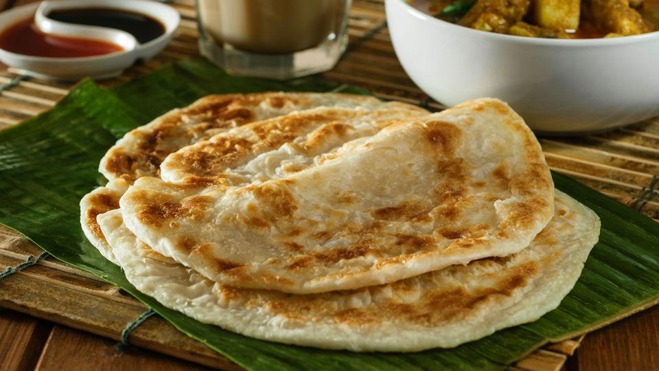 Bolani, Afghanistan, Lavash, Armenia, Damper bread, Australia, Luchi, Bangladesh, Pão de queijo, Brazil, Montreal bagels, Canada, Marraqueta, Chile, Shaobing, China, Pan Cubano, Cuba, Libba, Egypt, Pupusas, El Salvador, Injera, Ethiopia, Baguette, France, Khachapuri, Georgia, Pumpernickel, Germany, Pai bao, Hong Kong, Dökkt rúgbrauð, Iceland, Paratha, India, Roti gambang, Indonesia, Sangak, Iran, Soda bread, Ireland, Challah, Israel, Ciabatta, Italy, Bammy bread, Jamaica, Kare pan, Japan, Taboon bread, Jordan, Roti canai, Malaysia, Ħobż tal-Malti, Malta, Tortillas, Mexico, Khobz kesra, Morocco, Fry bread, Navajo Nation, Tijgerbrood, Netherlands, Rēwena parāoa, New Zealand, Lefse, Norway, Podplomyk, Poland, Broa de milho, Portugal, Karavai, Russia, Pane carasau, Sardinia, Proja, Serbia, Gyeran-ppang, South Korea, Appam, Sri Lanka, Kisra, Sudan and South Sudan, Limpa bread, Sweden, Balep korkun, Tibet, Simit, Turkey, Crumpets, United Kingdom, Biscuits, United States, Non, Uzbekistan, Arepa, Venezuela, Malawach, Yemen
