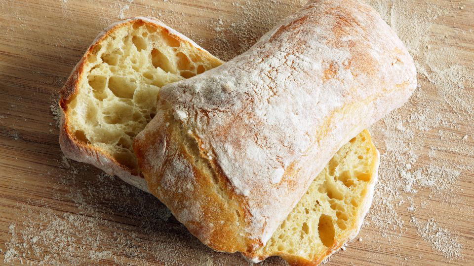 Bolani, Afghanistan, Lavash, Armenia, Damper bread, Australia, Luchi, Bangladesh, Pão de queijo, Brazil, Montreal bagels, Canada, Marraqueta, Chile, Shaobing, China, Pan Cubano, Cuba, Libba, Egypt, Pupusas, El Salvador, Injera, Ethiopia, Baguette, France, Khachapuri, Georgia, Pumpernickel, Germany, Pai bao, Hong Kong, Dökkt rúgbrauð, Iceland, Paratha, India, Roti gambang, Indonesia, Sangak, Iran, Soda bread, Ireland, Challah, Israel, Ciabatta, Italy, Bammy bread, Jamaica, Kare pan, Japan, Taboon bread, Jordan, Roti canai, Malaysia, Ħobż tal-Malti, Malta, Tortillas, Mexico, Khobz kesra, Morocco, Fry bread, Navajo Nation, Tijgerbrood, Netherlands, Rēwena parāoa, New Zealand, Lefse, Norway, Podplomyk, Poland, Broa de milho, Portugal, Karavai, Russia, Pane carasau, Sardinia, Proja, Serbia, Gyeran-ppang, South Korea, Appam, Sri Lanka, Kisra, Sudan and South Sudan, Limpa bread, Sweden, Balep korkun, Tibet, Simit, Turkey, Crumpets, United Kingdom, Biscuits, United States, Non, Uzbekistan, Arepa, Venezuela, Malawach, Yemen