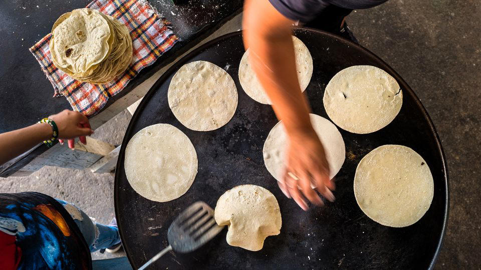 Bolani, Afghanistan, Lavash, Armenia, Damper bread, Australia, Luchi, Bangladesh, Pão de queijo, Brazil, Montreal bagels, Canada, Marraqueta, Chile, Shaobing, China, Pan Cubano, Cuba, Libba, Egypt, Pupusas, El Salvador, Injera, Ethiopia, Baguette, France, Khachapuri, Georgia, Pumpernickel, Germany, Pai bao, Hong Kong, Dökkt rúgbrauð, Iceland, Paratha, India, Roti gambang, Indonesia, Sangak, Iran, Soda bread, Ireland, Challah, Israel, Ciabatta, Italy, Bammy bread, Jamaica, Kare pan, Japan, Taboon bread, Jordan, Roti canai, Malaysia, Ħobż tal-Malti, Malta, Tortillas, Mexico, Khobz kesra, Morocco, Fry bread, Navajo Nation, Tijgerbrood, Netherlands, Rēwena parāoa, New Zealand, Lefse, Norway, Podplomyk, Poland, Broa de milho, Portugal, Karavai, Russia, Pane carasau, Sardinia, Proja, Serbia, Gyeran-ppang, South Korea, Appam, Sri Lanka, Kisra, Sudan and South Sudan, Limpa bread, Sweden, Balep korkun, Tibet, Simit, Turkey, Crumpets, United Kingdom, Biscuits, United States, Non, Uzbekistan, Arepa, Venezuela, Malawach, Yemen