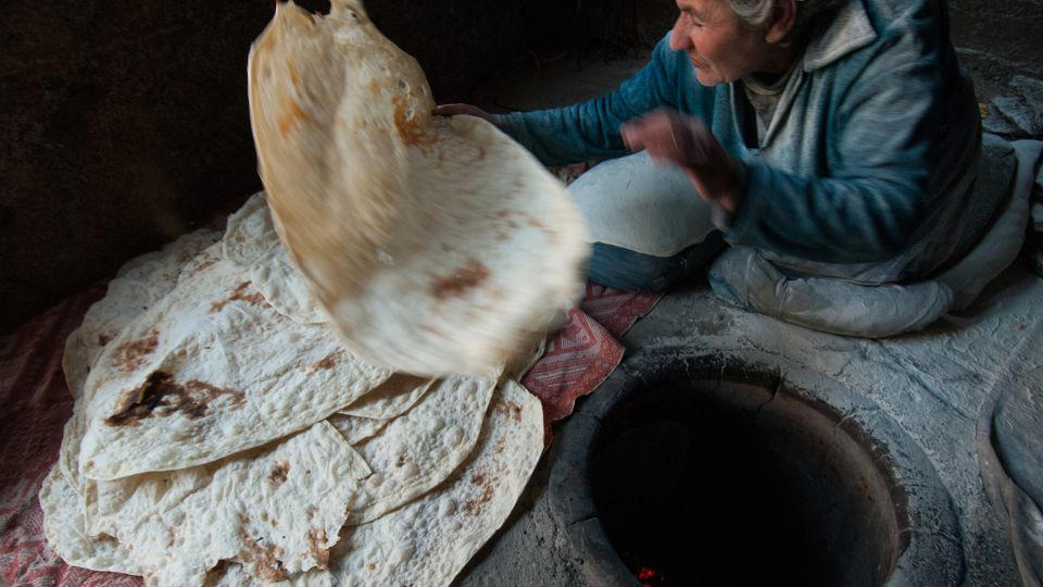 Bolani, Afghanistan, Lavash, Armenia, Damper bread, Australia, Luchi, Bangladesh, Pão de queijo, Brazil, Montreal bagels, Canada, Marraqueta, Chile, Shaobing, China, Pan Cubano, Cuba, Libba, Egypt, Pupusas, El Salvador, Injera, Ethiopia, Baguette, France, Khachapuri, Georgia, Pumpernickel, Germany, Pai bao, Hong Kong, Dökkt rúgbrauð, Iceland, Paratha, India, Roti gambang, Indonesia, Sangak, Iran, Soda bread, Ireland, Challah, Israel, Ciabatta, Italy, Bammy bread, Jamaica, Kare pan, Japan, Taboon bread, Jordan, Roti canai, Malaysia, Ħobż tal-Malti, Malta, Tortillas, Mexico, Khobz kesra, Morocco, Fry bread, Navajo Nation, Tijgerbrood, Netherlands, Rēwena parāoa, New Zealand, Lefse, Norway, Podplomyk, Poland, Broa de milho, Portugal, Karavai, Russia, Pane carasau, Sardinia, Proja, Serbia, Gyeran-ppang, South Korea, Appam, Sri Lanka, Kisra, Sudan and South Sudan, Limpa bread, Sweden, Balep korkun, Tibet, Simit, Turkey, Crumpets, United Kingdom, Biscuits, United States, Non, Uzbekistan, Arepa, Venezuela, Malawach, Yemen