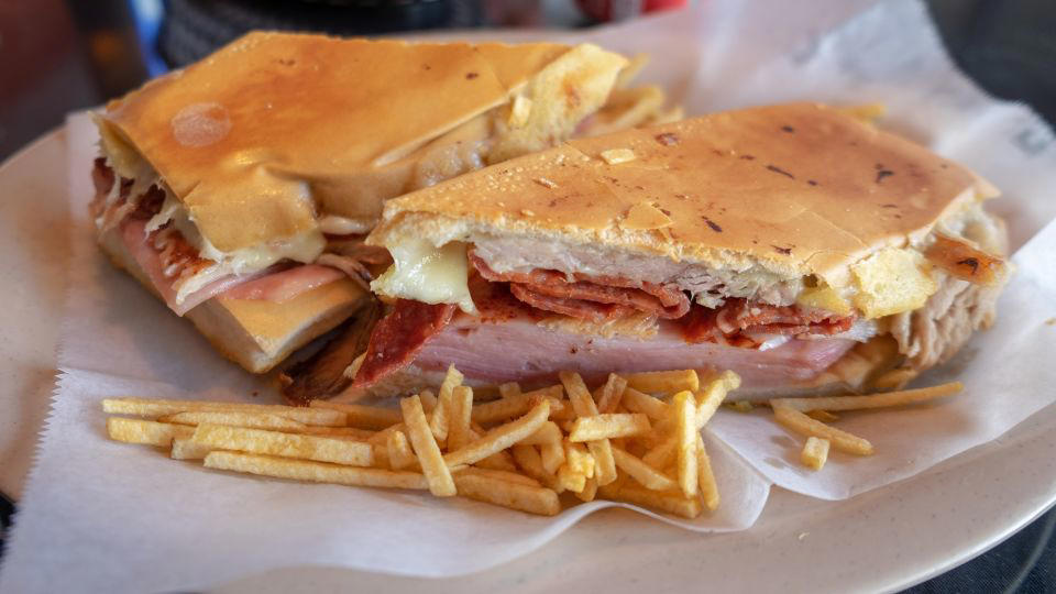 Bolani, Afghanistan, Lavash, Armenia, Damper bread, Australia, Luchi, Bangladesh, Pão de queijo, Brazil, Montreal bagels, Canada, Marraqueta, Chile, Shaobing, China, Pan Cubano, Cuba, Libba, Egypt, Pupusas, El Salvador, Injera, Ethiopia, Baguette, France, Khachapuri, Georgia, Pumpernickel, Germany, Pai bao, Hong Kong, Dökkt rúgbrauð, Iceland, Paratha, India, Roti gambang, Indonesia, Sangak, Iran, Soda bread, Ireland, Challah, Israel, Ciabatta, Italy, Bammy bread, Jamaica, Kare pan, Japan, Taboon bread, Jordan, Roti canai, Malaysia, Ħobż tal-Malti, Malta, Tortillas, Mexico, Khobz kesra, Morocco, Fry bread, Navajo Nation, Tijgerbrood, Netherlands, Rēwena parāoa, New Zealand, Lefse, Norway, Podplomyk, Poland, Broa de milho, Portugal, Karavai, Russia, Pane carasau, Sardinia, Proja, Serbia, Gyeran-ppang, South Korea, Appam, Sri Lanka, Kisra, Sudan and South Sudan, Limpa bread, Sweden, Balep korkun, Tibet, Simit, Turkey, Crumpets, United Kingdom, Biscuits, United States, Non, Uzbekistan, Arepa, Venezuela, Malawach, Yemen