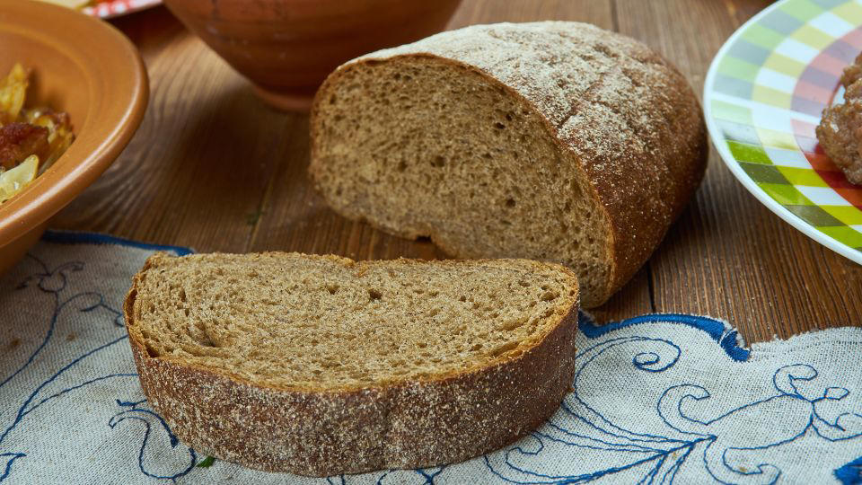 Bolani, Afghanistan, Lavash, Armenia, Damper bread, Australia, Luchi, Bangladesh, Pão de queijo, Brazil, Montreal bagels, Canada, Marraqueta, Chile, Shaobing, China, Pan Cubano, Cuba, Libba, Egypt, Pupusas, El Salvador, Injera, Ethiopia, Baguette, France, Khachapuri, Georgia, Pumpernickel, Germany, Pai bao, Hong Kong, Dökkt rúgbrauð, Iceland, Paratha, India, Roti gambang, Indonesia, Sangak, Iran, Soda bread, Ireland, Challah, Israel, Ciabatta, Italy, Bammy bread, Jamaica, Kare pan, Japan, Taboon bread, Jordan, Roti canai, Malaysia, Ħobż tal-Malti, Malta, Tortillas, Mexico, Khobz kesra, Morocco, Fry bread, Navajo Nation, Tijgerbrood, Netherlands, Rēwena parāoa, New Zealand, Lefse, Norway, Podplomyk, Poland, Broa de milho, Portugal, Karavai, Russia, Pane carasau, Sardinia, Proja, Serbia, Gyeran-ppang, South Korea, Appam, Sri Lanka, Kisra, Sudan and South Sudan, Limpa bread, Sweden, Balep korkun, Tibet, Simit, Turkey, Crumpets, United Kingdom, Biscuits, United States, Non, Uzbekistan, Arepa, Venezuela, Malawach, Yemen