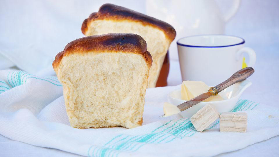Bolani, Afghanistan, Lavash, Armenia, Damper bread, Australia, Luchi, Bangladesh, Pão de queijo, Brazil, Montreal bagels, Canada, Marraqueta, Chile, Shaobing, China, Pan Cubano, Cuba, Libba, Egypt, Pupusas, El Salvador, Injera, Ethiopia, Baguette, France, Khachapuri, Georgia, Pumpernickel, Germany, Pai bao, Hong Kong, Dökkt rúgbrauð, Iceland, Paratha, India, Roti gambang, Indonesia, Sangak, Iran, Soda bread, Ireland, Challah, Israel, Ciabatta, Italy, Bammy bread, Jamaica, Kare pan, Japan, Taboon bread, Jordan, Roti canai, Malaysia, Ħobż tal-Malti, Malta, Tortillas, Mexico, Khobz kesra, Morocco, Fry bread, Navajo Nation, Tijgerbrood, Netherlands, Rēwena parāoa, New Zealand, Lefse, Norway, Podplomyk, Poland, Broa de milho, Portugal, Karavai, Russia, Pane carasau, Sardinia, Proja, Serbia, Gyeran-ppang, South Korea, Appam, Sri Lanka, Kisra, Sudan and South Sudan, Limpa bread, Sweden, Balep korkun, Tibet, Simit, Turkey, Crumpets, United Kingdom, Biscuits, United States, Non, Uzbekistan, Arepa, Venezuela, Malawach, Yemen