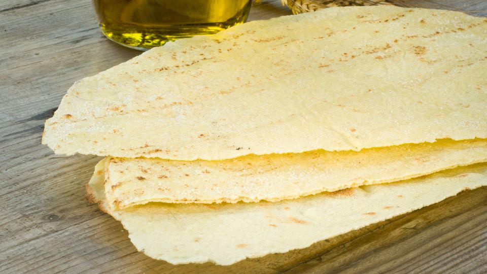 Bolani, Afghanistan, Lavash, Armenia, Damper bread, Australia, Luchi, Bangladesh, Pão de queijo, Brazil, Montreal bagels, Canada, Marraqueta, Chile, Shaobing, China, Pan Cubano, Cuba, Libba, Egypt, Pupusas, El Salvador, Injera, Ethiopia, Baguette, France, Khachapuri, Georgia, Pumpernickel, Germany, Pai bao, Hong Kong, Dökkt rúgbrauð, Iceland, Paratha, India, Roti gambang, Indonesia, Sangak, Iran, Soda bread, Ireland, Challah, Israel, Ciabatta, Italy, Bammy bread, Jamaica, Kare pan, Japan, Taboon bread, Jordan, Roti canai, Malaysia, Ħobż tal-Malti, Malta, Tortillas, Mexico, Khobz kesra, Morocco, Fry bread, Navajo Nation, Tijgerbrood, Netherlands, Rēwena parāoa, New Zealand, Lefse, Norway, Podplomyk, Poland, Broa de milho, Portugal, Karavai, Russia, Pane carasau, Sardinia, Proja, Serbia, Gyeran-ppang, South Korea, Appam, Sri Lanka, Kisra, Sudan and South Sudan, Limpa bread, Sweden, Balep korkun, Tibet, Simit, Turkey, Crumpets, United Kingdom, Biscuits, United States, Non, Uzbekistan, Arepa, Venezuela, Malawach, Yemen