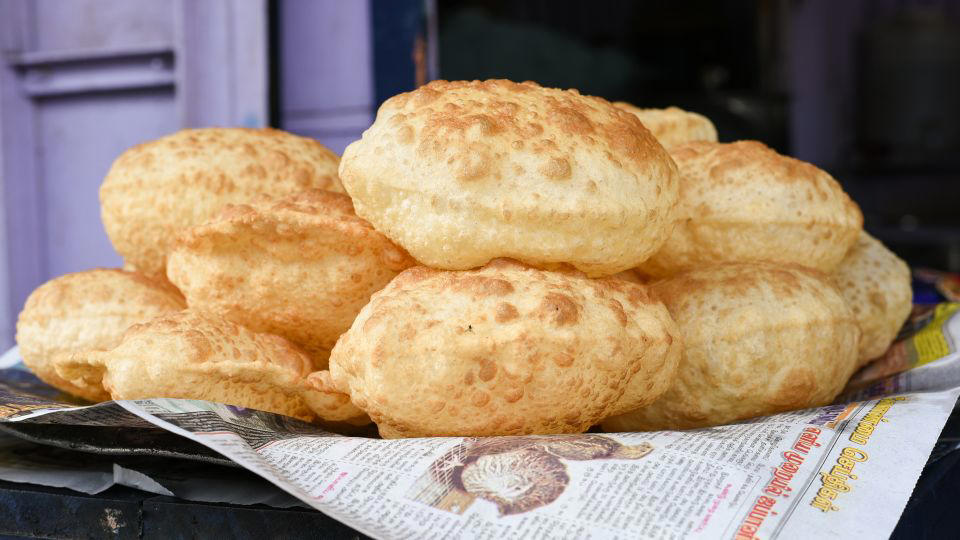 Bolani, Afghanistan, Lavash, Armenia, Damper bread, Australia, Luchi, Bangladesh, Pão de queijo, Brazil, Montreal bagels, Canada, Marraqueta, Chile, Shaobing, China, Pan Cubano, Cuba, Libba, Egypt, Pupusas, El Salvador, Injera, Ethiopia, Baguette, France, Khachapuri, Georgia, Pumpernickel, Germany, Pai bao, Hong Kong, Dökkt rúgbrauð, Iceland, Paratha, India, Roti gambang, Indonesia, Sangak, Iran, Soda bread, Ireland, Challah, Israel, Ciabatta, Italy, Bammy bread, Jamaica, Kare pan, Japan, Taboon bread, Jordan, Roti canai, Malaysia, Ħobż tal-Malti, Malta, Tortillas, Mexico, Khobz kesra, Morocco, Fry bread, Navajo Nation, Tijgerbrood, Netherlands, Rēwena parāoa, New Zealand, Lefse, Norway, Podplomyk, Poland, Broa de milho, Portugal, Karavai, Russia, Pane carasau, Sardinia, Proja, Serbia, Gyeran-ppang, South Korea, Appam, Sri Lanka, Kisra, Sudan and South Sudan, Limpa bread, Sweden, Balep korkun, Tibet, Simit, Turkey, Crumpets, United Kingdom, Biscuits, United States, Non, Uzbekistan, Arepa, Venezuela, Malawach, Yemen