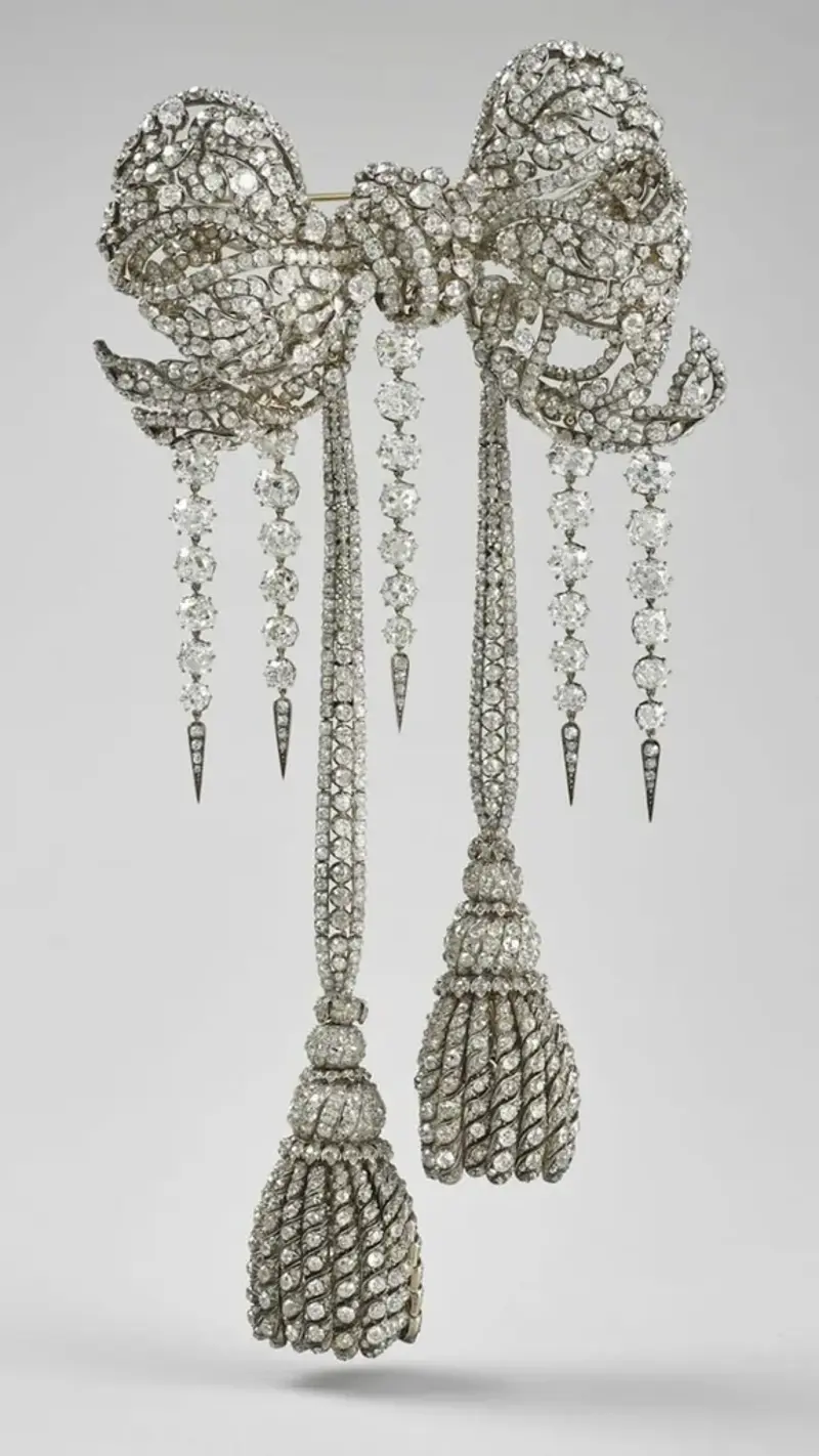 Every Crown Jewel Stolen From The Louvre: , The Crown of Empress Eugénie, The Diadem of Empress Eugénie, Empress Eugénie’s Diamond Bow Brooch , Empress Eugénie’s Reliquary Brooch, The Sapphire Parure: Tiara, Necklace and Earrings, Napoléon I’s Emerald Wedding Gift to Marie-Louise, Empress of France