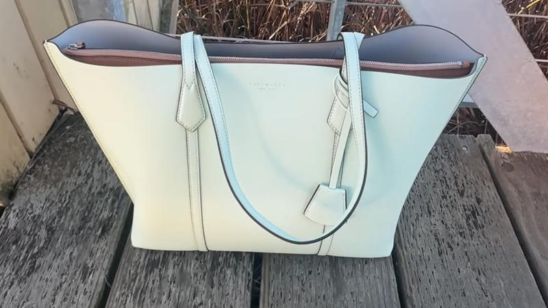 20. Tory Burch Perry Bombe 1. Cuyana System Zipper Tote, 2. MZ Wallace Medium Metro Tote, 3. Telfar Shopping Tote, 4. L.L.Bean Boat And Tote Zip-Top, 5. Kate Spade Nylon Tote, 6. Charles & Keith Tote Bag, 7. Quince Italian Leather Triple Compartment Tote, 8. Calpak Luka Large Tote, 9. Madewell The Essential Bucket Tote, 10. Freja NYC The Tall Tote, 11. Bellroy Tokyo Tote, 12. Sézane Mara Bag, 13. The Row Mesh Market Tote, 14. Kaai Midi Pyramid Tote, 15. Mansur Gavriel Everyday Soft Leather Tote, 16. Bottega Veneta Andiamo Tote, 17. Miu Miu Ivy Leather Tote, 18. Bao Bao Issey Miyake Prism Tote, 19. Aspinal Of London Regent Tote, 20. Tory Burch Perry Bombe