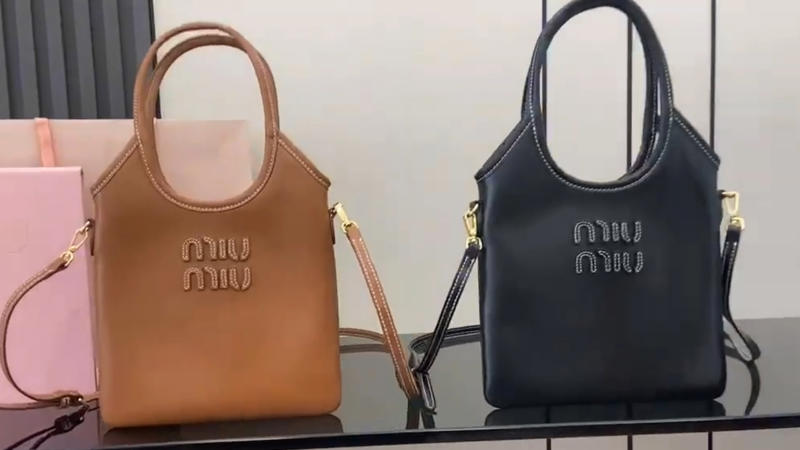 17. Miu Miu Ivy Leather Tote 1. Cuyana System Zipper Tote, 2. MZ Wallace Medium Metro Tote, 3. Telfar Shopping Tote, 4. L.L.Bean Boat And Tote Zip-Top, 5. Kate Spade Nylon Tote, 6. Charles & Keith Tote Bag, 7. Quince Italian Leather Triple Compartment Tote, 8. Calpak Luka Large Tote, 9. Madewell The Essential Bucket Tote, 10. Freja NYC The Tall Tote, 11. Bellroy Tokyo Tote, 12. Sézane Mara Bag, 13. The Row Mesh Market Tote, 14. Kaai Midi Pyramid Tote, 15. Mansur Gavriel Everyday Soft Leather Tote, 16. Bottega Veneta Andiamo Tote, 17. Miu Miu Ivy Leather Tote, 18. Bao Bao Issey Miyake Prism Tote, 19. Aspinal Of London Regent Tote, 20. Tory Burch Perry Bombe