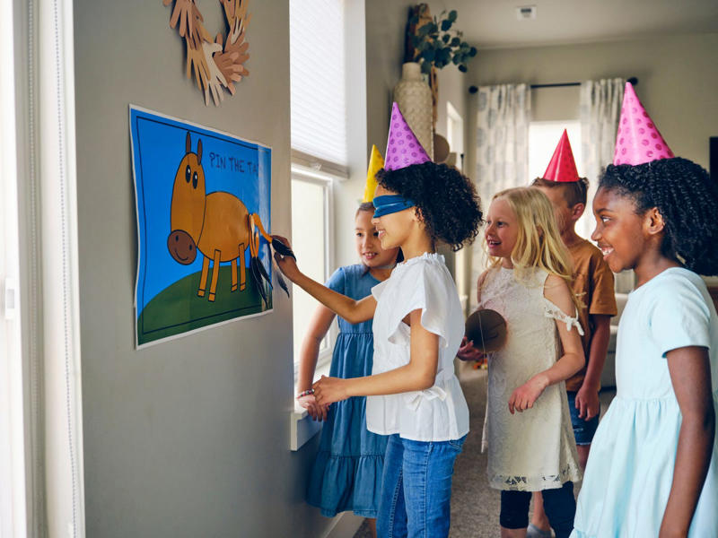 17) Pin the Tail on the Donkey 1) Fish Bowl, 2) Euchre, 3) Lip Sync Battle, 4) Freeze Dance, 5) Flip Cup, 6) Limbo, 7) 20 Questions, 8) Musical Chairs, 9) Never Have I Ever, 10) Spoons, 11) Heads Up 7 Up, 12) Name That Tune, 14) Minute to Win It Games, 15) Post It Note Game, 16) Bobbing for Apples, 17) Pin the Tail on the Donkey, 18) Charades, 19) Hot Ones, 20) Egg and Spoon Race, 21) Two Truths and a Lie, 22) Oreo Game, 23) Superlatives, 24) Telephone, 25) Twister, 26) Would You Rather, 27) Dangling Donuts, 28) iSpy